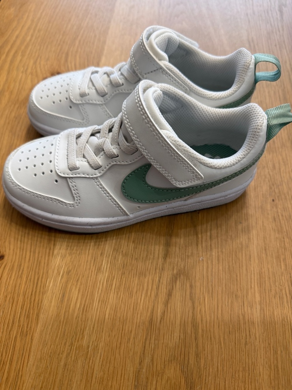 Nike Kids White Sneakers with Mint Swoosh and Pull Tab